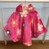 Erkroosa lilleline autosõidu poncho lapsele vanuses 1-3 aastat